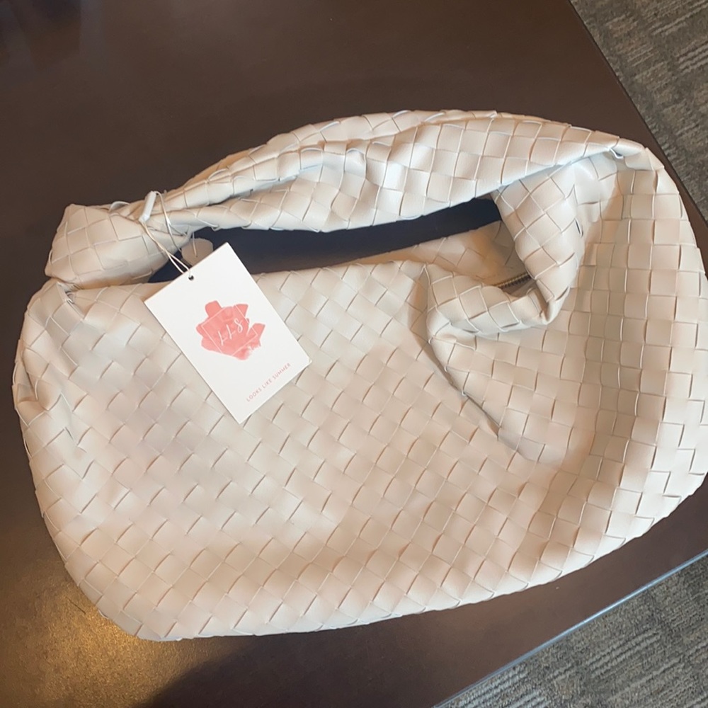 Looks like summer cream colored bag